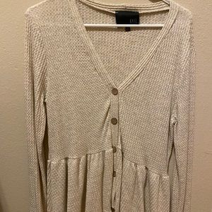 V neck button shirt.